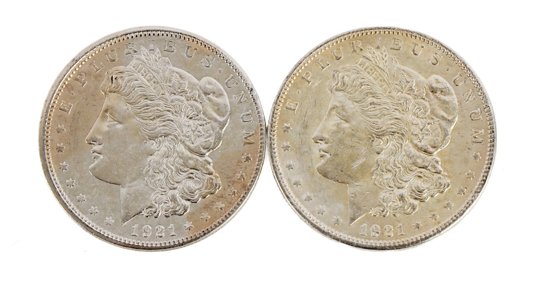 TWO 1921 US MORGAN SILVER DOLLAR COIN: 90% purity. This lot reserved at melt. || Payment & Shipping: Accounts without purchase history must pay via Zelle, money order, cashier's check or wire transfer. Items will ship within 10 business da