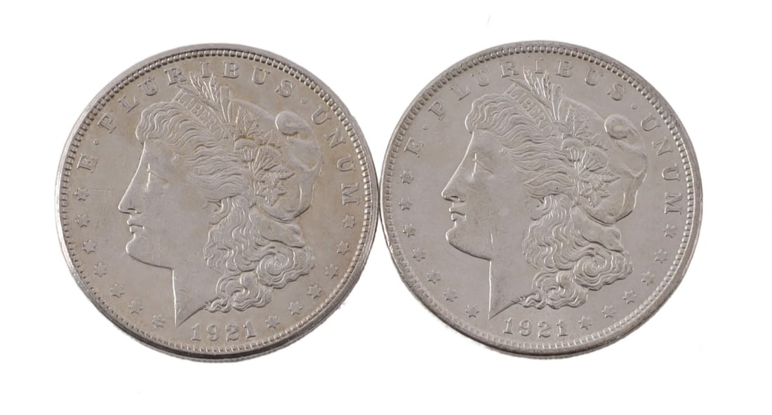 TWO 1921 US MORGAN SILVER DOLLAR COIN: 90% purity. This lot reserved at melt. || Payment & Shipping: Accounts without purchase history must pay via Zelle, money order, cashier's check or wire transfer. Items will ship within 10 business da