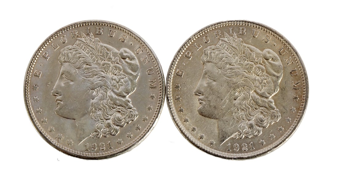 TWO 1921 US MORGAN SILVER DOLLAR COIN: 90% purity. This lot reserved at melt. || Payment & Shipping: Accounts without purchase history must pay via Zelle, money order, cashier's check or wire transfer. Items will ship within 10 business da