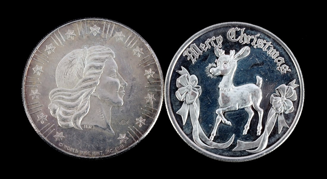 TWO 1 OUNCE SILVER BULLION ROUNDS: Florida round and Morgan silver dollar round This lot has a reserve.