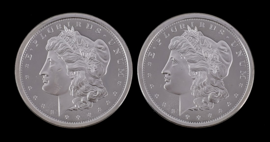 2 ONE TROY OUNCE .999 SILVER MORGAN DOLLAR ROUNDS: .999 fine silver rounds with Morgan silver dollar design. This lot has a reserve.