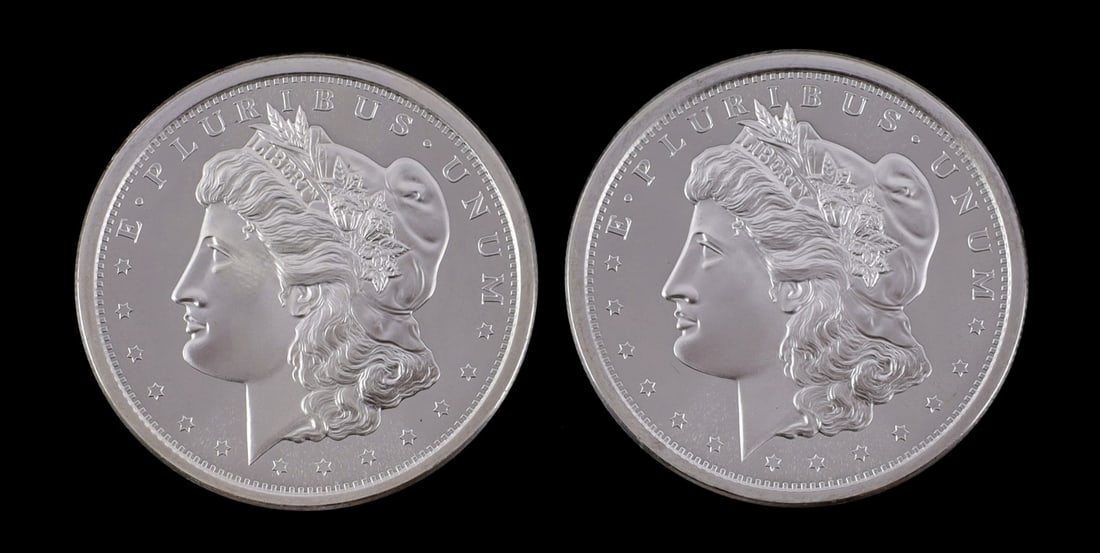 2 ONE TROY OUNCE .999 SILVER MORGAN DOLLAR ROUNDS: .999 fine silver rounds with Morgan silver dollar design. This lot has a reserve.