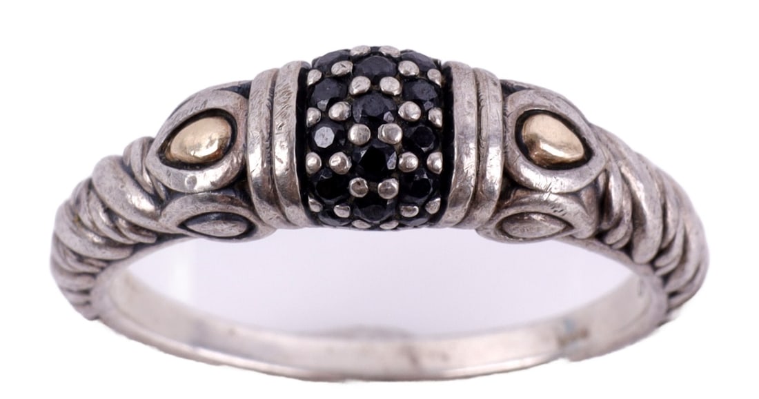 14KT 925 STERLING SILVER BLACK CZ RING BY JAI: Sterling silver ring with 14kt yellow gold inlay. Center of ring has black CZ diamonds. Stamped "Thailand, 925, 14kt, Jai, CZ." This lot has a reserve.