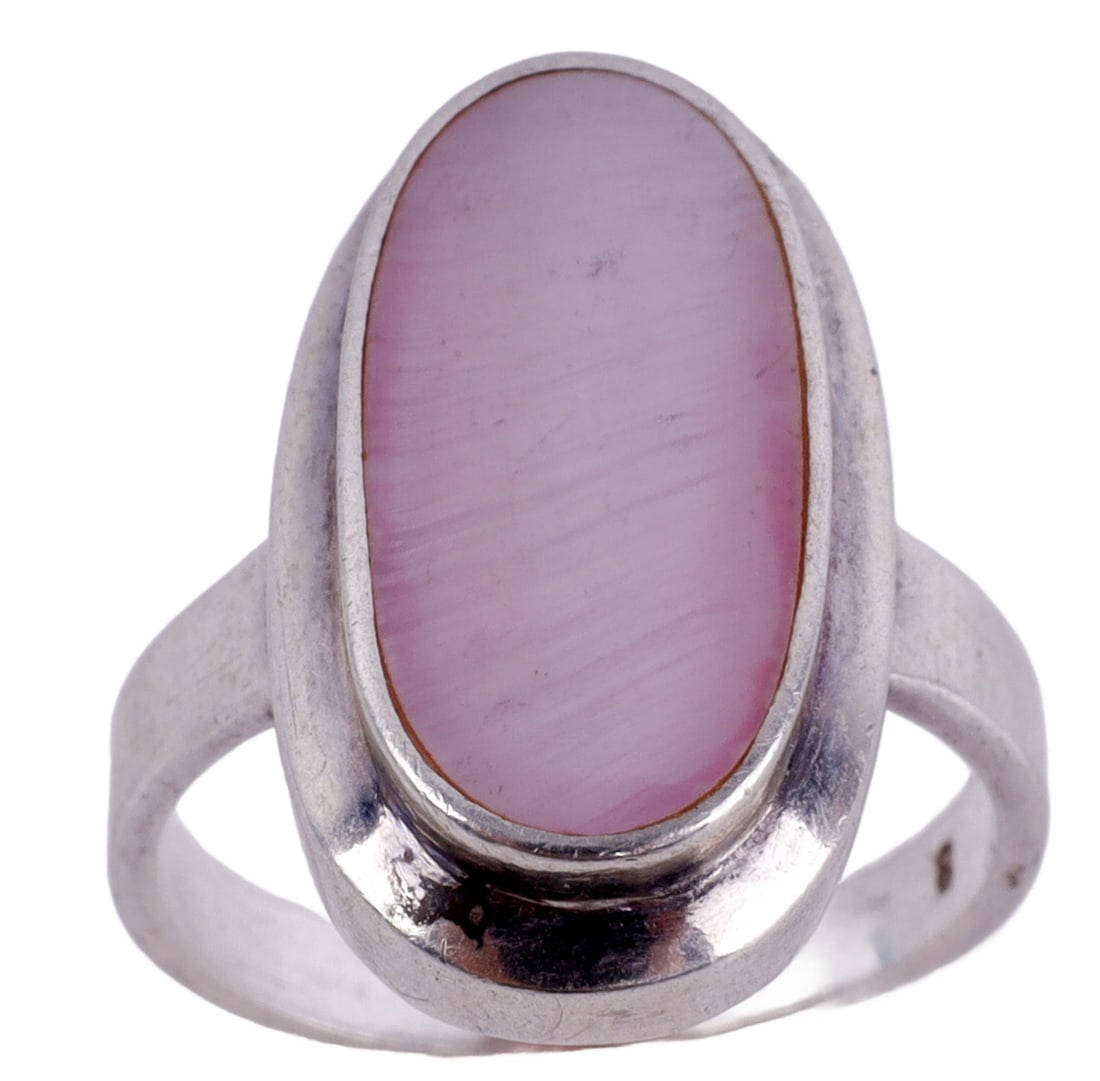 AVON 925 STERLING SILVER PINK MOTHER OF PEARL RING: Sterling silver Avon pink mother of pearl statement ring. Stone size 14.26 X 9.72 mm. Ring size 8. Stamped " Avon 925." This lot has a reserve.