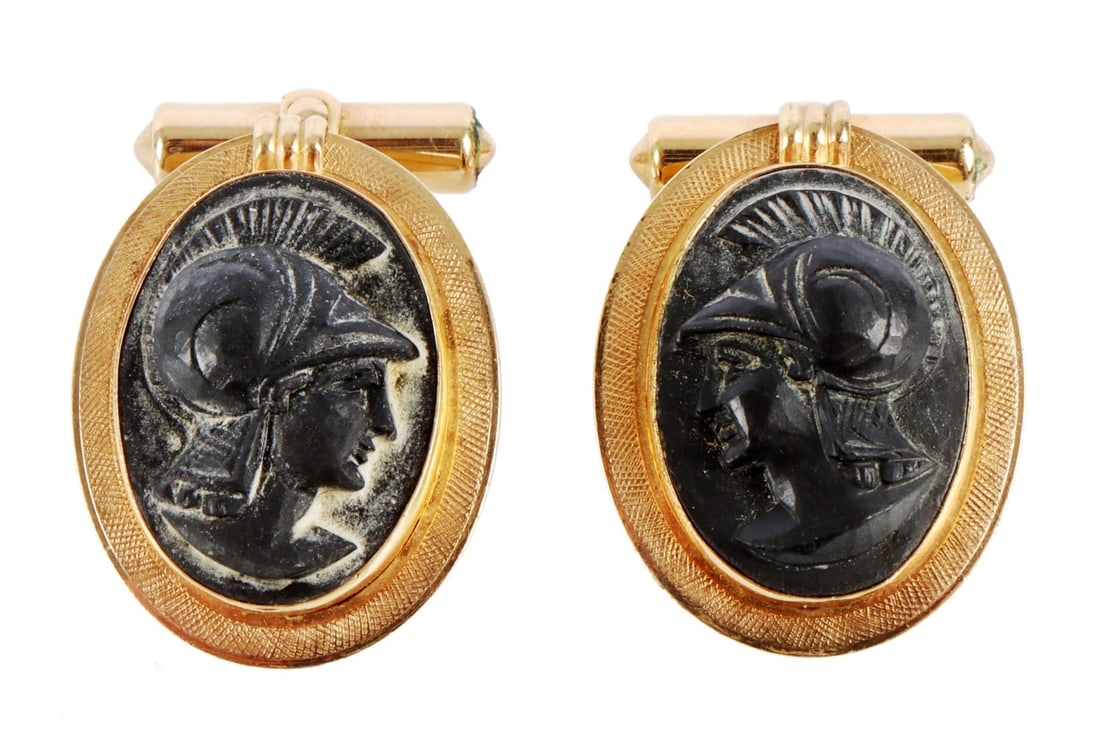 DESTINO ARMORED GREEK HEAD CUFFLINKS: A pair of gold-filled cufflinks featuring an armored Greek warrior. 12kt gold fill. 10 grams total weight. This lot has a reserve.