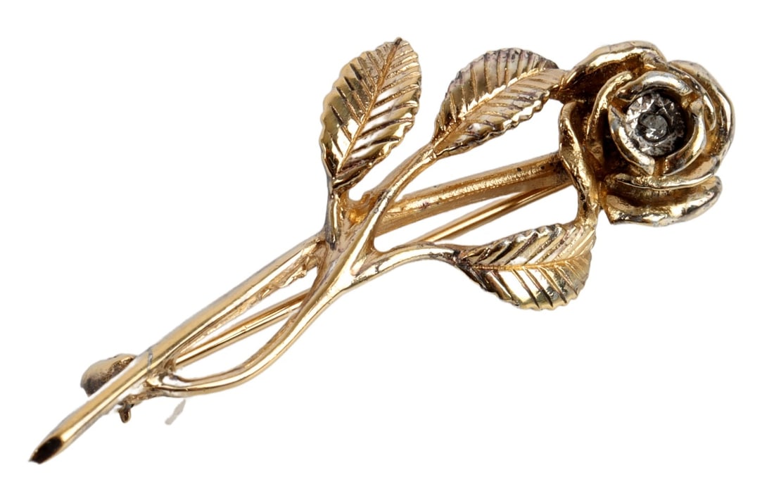 VINTAGE 925 STERLING SILVER AVON ROSE BROOCH: Vintage sterling silver Avon rose brooch with diamond. Stamped "Avon sterling." Size 1.5 X 0.61 X 0.3 inches. This lot has a reserve.