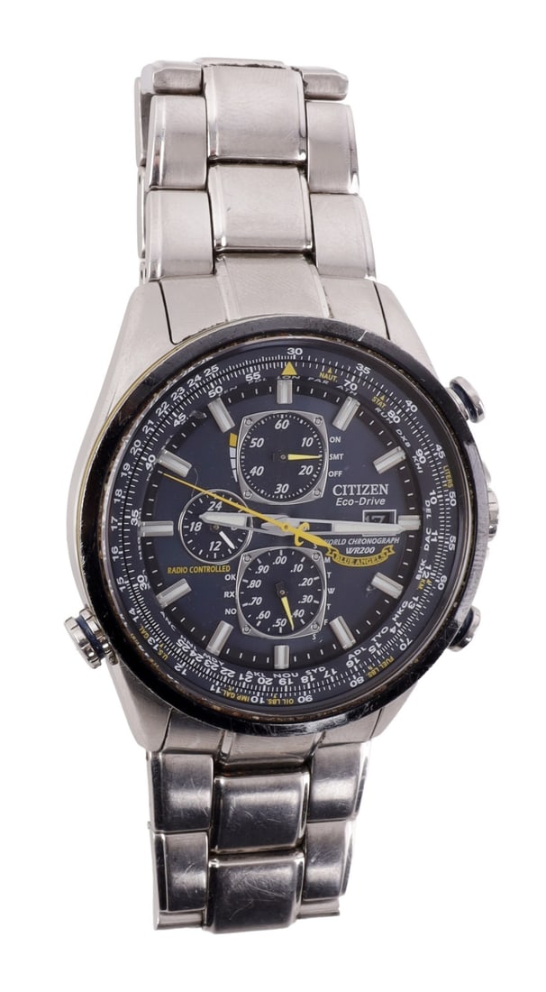 CITIZEN ECO DRIVE BLUE ANGELS WRIST WATCH: Citizen Eco-Drive Radio-Controlled Chronograph World Timer; Blue Angels edition with case back insignia. Atomic time in 26 world cities; radio-controlled accuracy in 5 zones. 1/20 second chrono up to