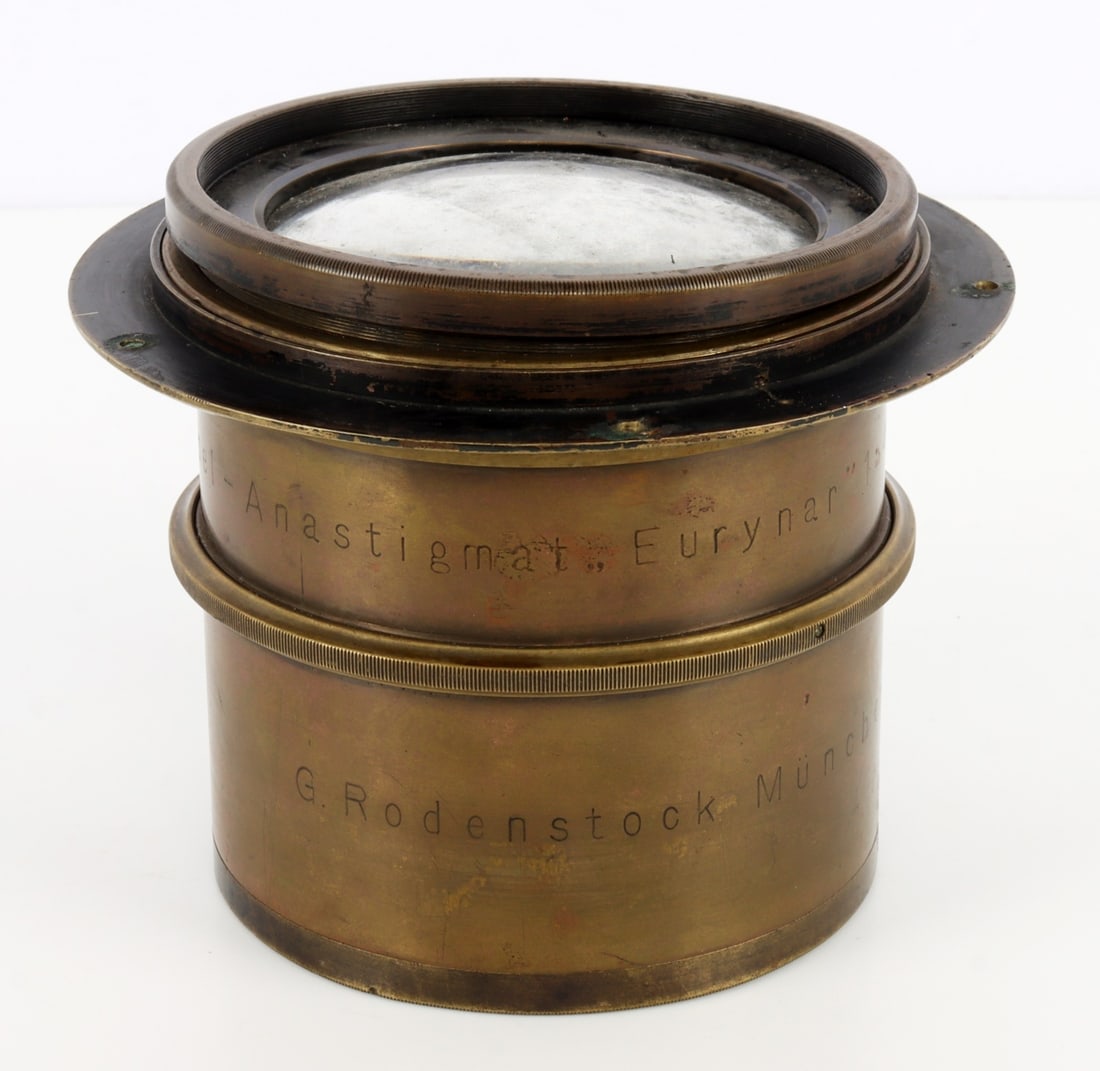G RODENSTOCK DOPPEL-ANASTIGMAT EURYNAR CAMERA LENS: Marked "G Rodenstock Munchen" and "Doppel-Anastigmat "Eurynar" 1:4,5 f=36cm." Mounting ring drilled with 5 holes, spaced approx. 3 inches.