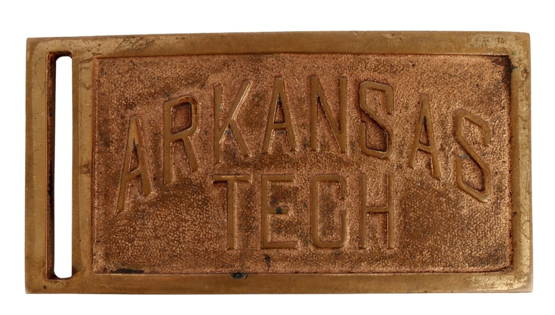 ANTIQUE ARKANSAS TECH BELT BUCKLE RARE: A rare instance of an antique Arkansas Tech belt buckle. 3.75 X 2.2 inches.