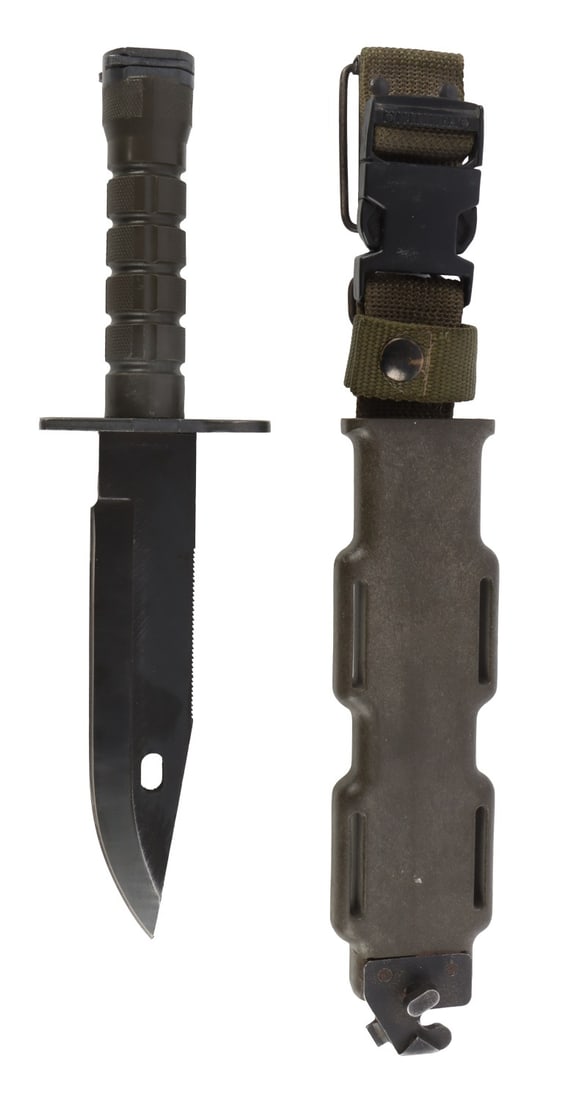 US M9 LAN-CAY KNIFE BAYONET WITH SCABBARD: M9 bayonet with scabbard and belt hanger. Ricasso marked "M9 LAN-CAY U.S.A." Blade length 7.25 inches. Overall length 12.25 inches.