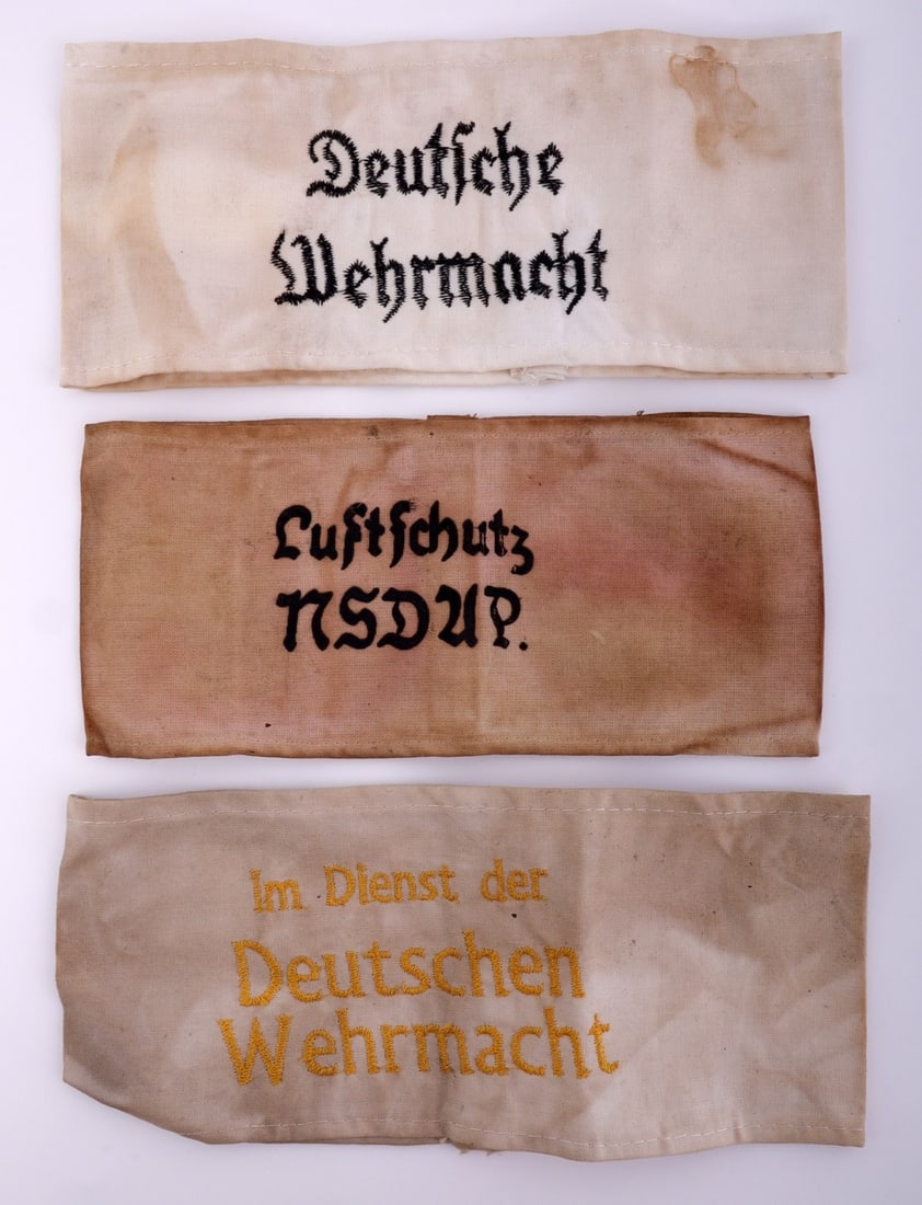 WWII GERMAN THIRD REICH WEHRMACHT ARMBANDS LOT 3: Three armbands of the German Third Reich. 1) Im dienst der Deutschen Wehrmacht. 2) Luftschutz NSDAP. 3) Deutsche Wehrmacht.
