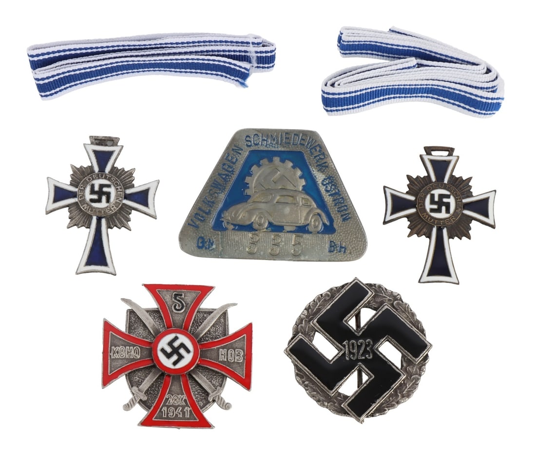 WWII GERMAN THIRD REICH ASSORTED BADGES LOT OF 5: 1) Mother's cross in silver. 2) Mother's cross in bronze. 3) Russian Cossacks badge. 4) Volkswagen factory badge. 5) 1932 NSDAP badge.