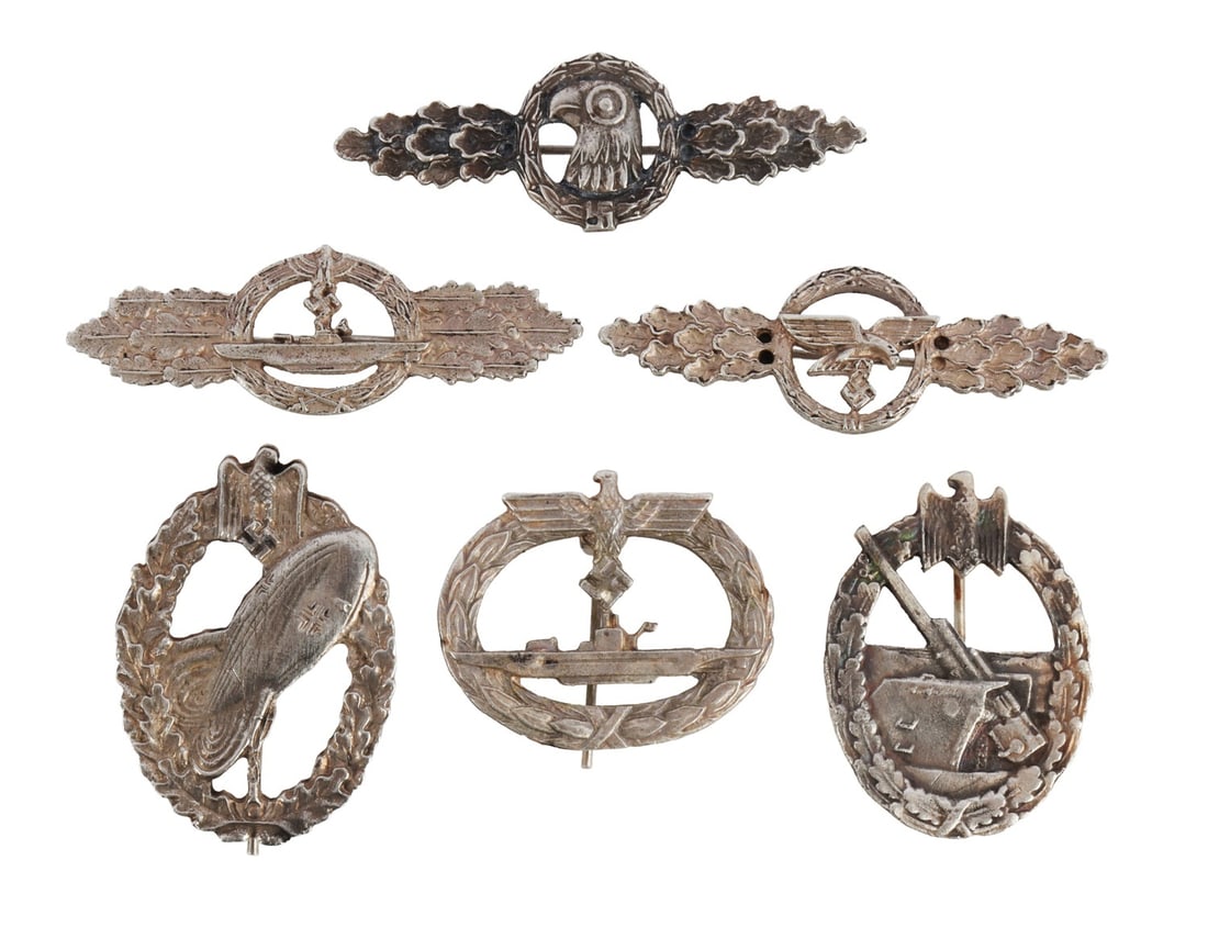 WWII GERMAN THIRD REICH BADGES LOT OF 6: A mix of various badges of the German Third Reich. 1) Kriegsmarine U-Boat. 2) Kriegsmarine U-Boat clasp. 3) Heer balloon pilot. 4) Kriegsmarine coastal artillery. 5) Luftwaffe reconnaissance clasp. 6)