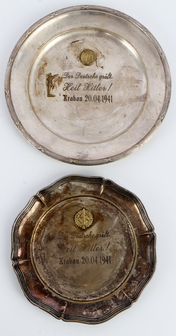 WWII GERMAN THIRD REICH KRAKOW ASHTRAYS LOT OF 2: Two ashtrays commemorating the Third Reich's defeat and occupation of Poland. Both read "Der Deutsche Grusst: Heil Hitler! Krakau 20.04.1941."