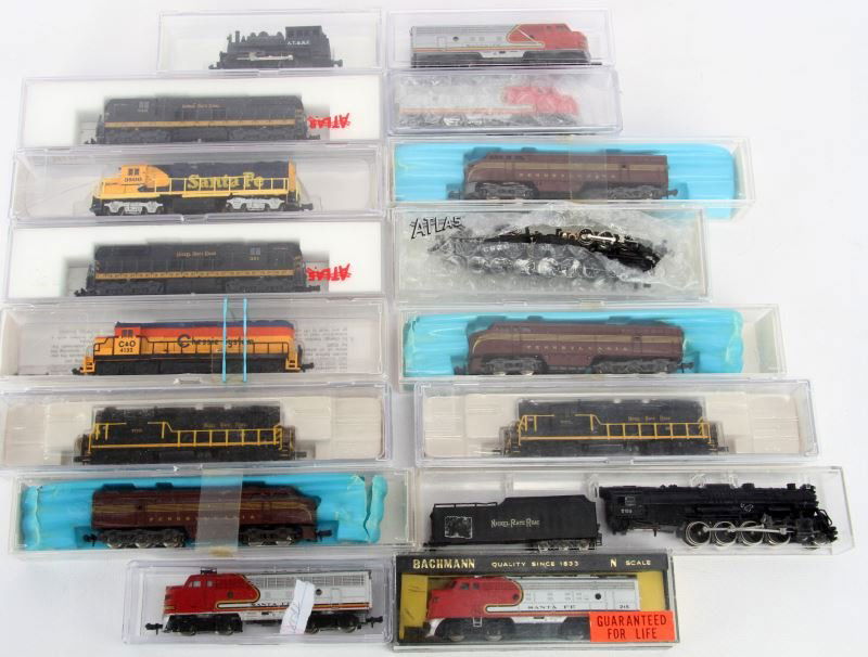 N GAUGE ENGINE LOT BACHMANN ATLAS LIFE LIKE TRX: Most appear to be mint or near mint with most in original boxes, includes two TRX Western Series, Bachmann Santa Fe, Life Like 7843, Atlas 4537, Bachmann Loco and Coal Car, two Atlas 2134, three Atlas