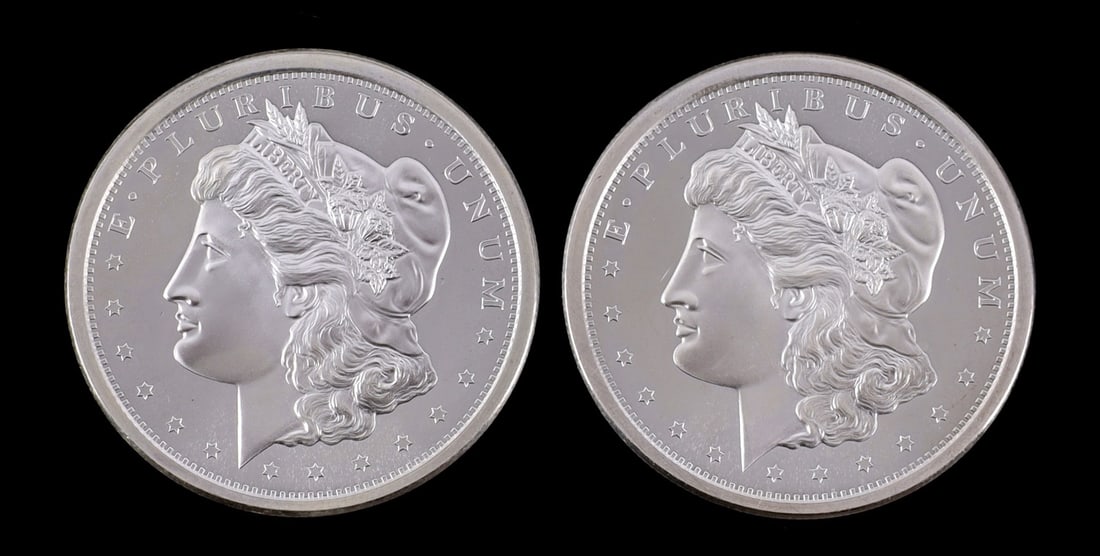 2 ONE TROY OUNCE .999 SILVER MORGAN DOLLAR ROUNDS: .999 fine silver rounds with Morgan silver dollar design. This lot has a reserve.