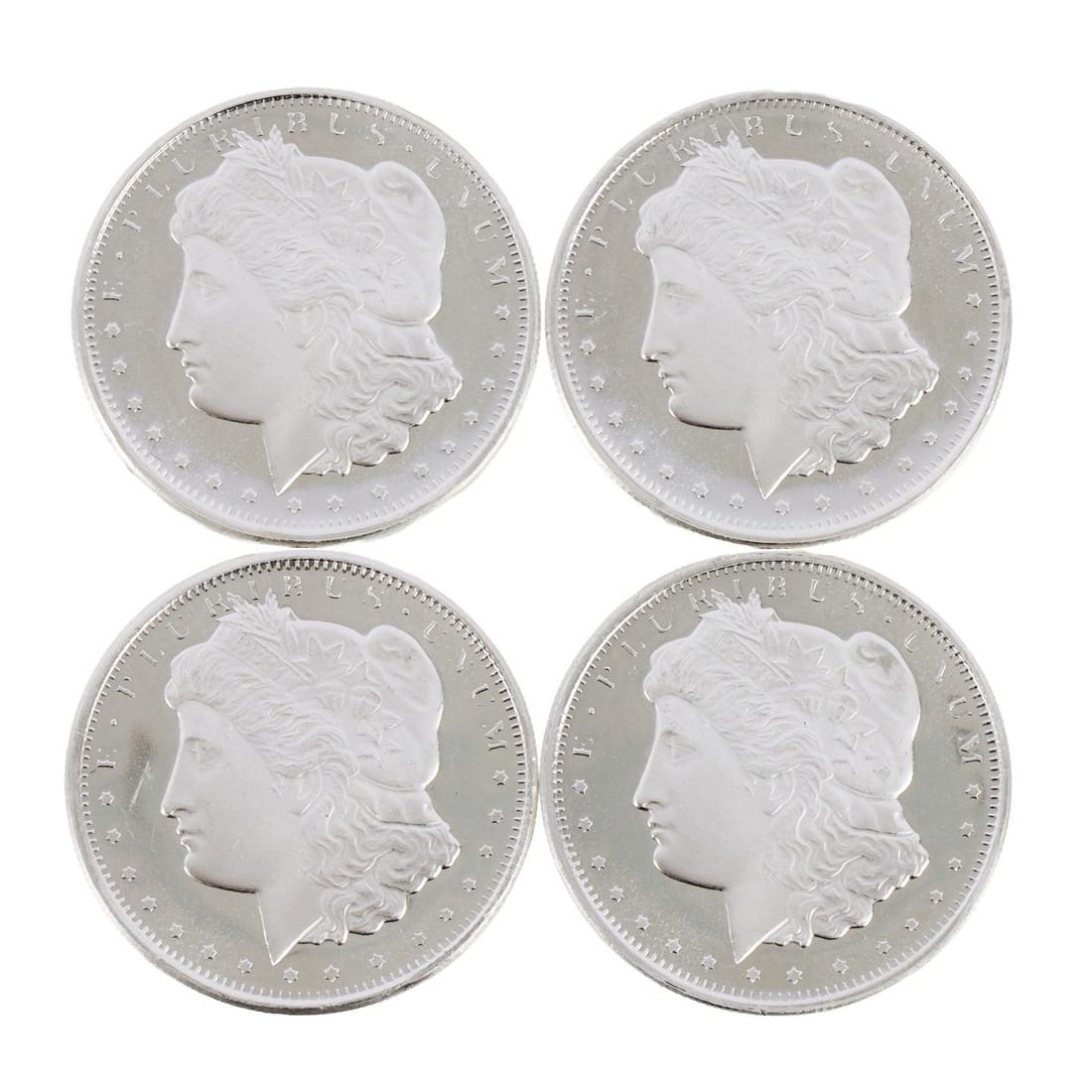 4 HALF OUNCE .999 SILVER MORGAN ROUNDS: Fine silver. This lot has a reserve.