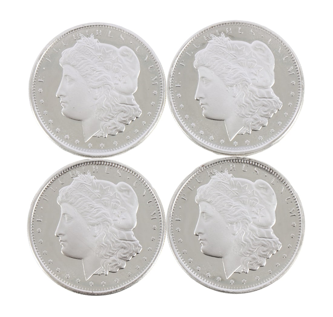 4 HALF OUNCE .999 SILVER MORGAN ROUNDS: Fine silver. This lot has a reserve.