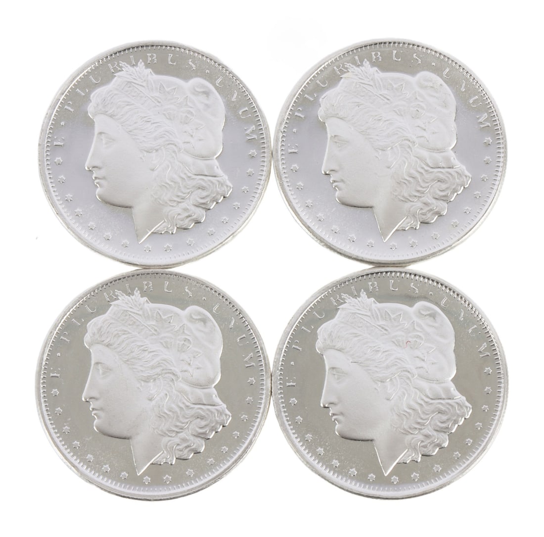 4 HALF OUNCE .999 SILVER MORGAN ROUNDS: Fine silver. This lot has a reserve.