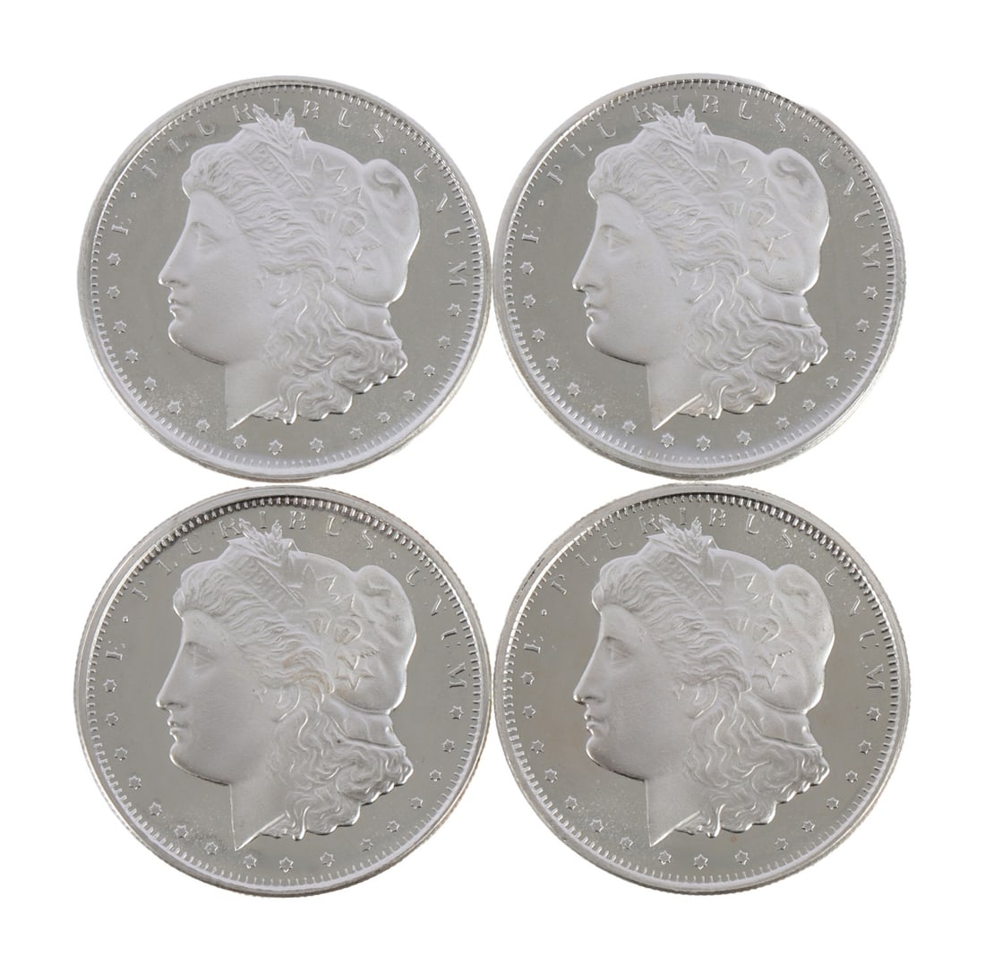 4 HALF OUNCE .999 SILVER MORGAN ROUNDS: Fine silver. This lot has a reserve.