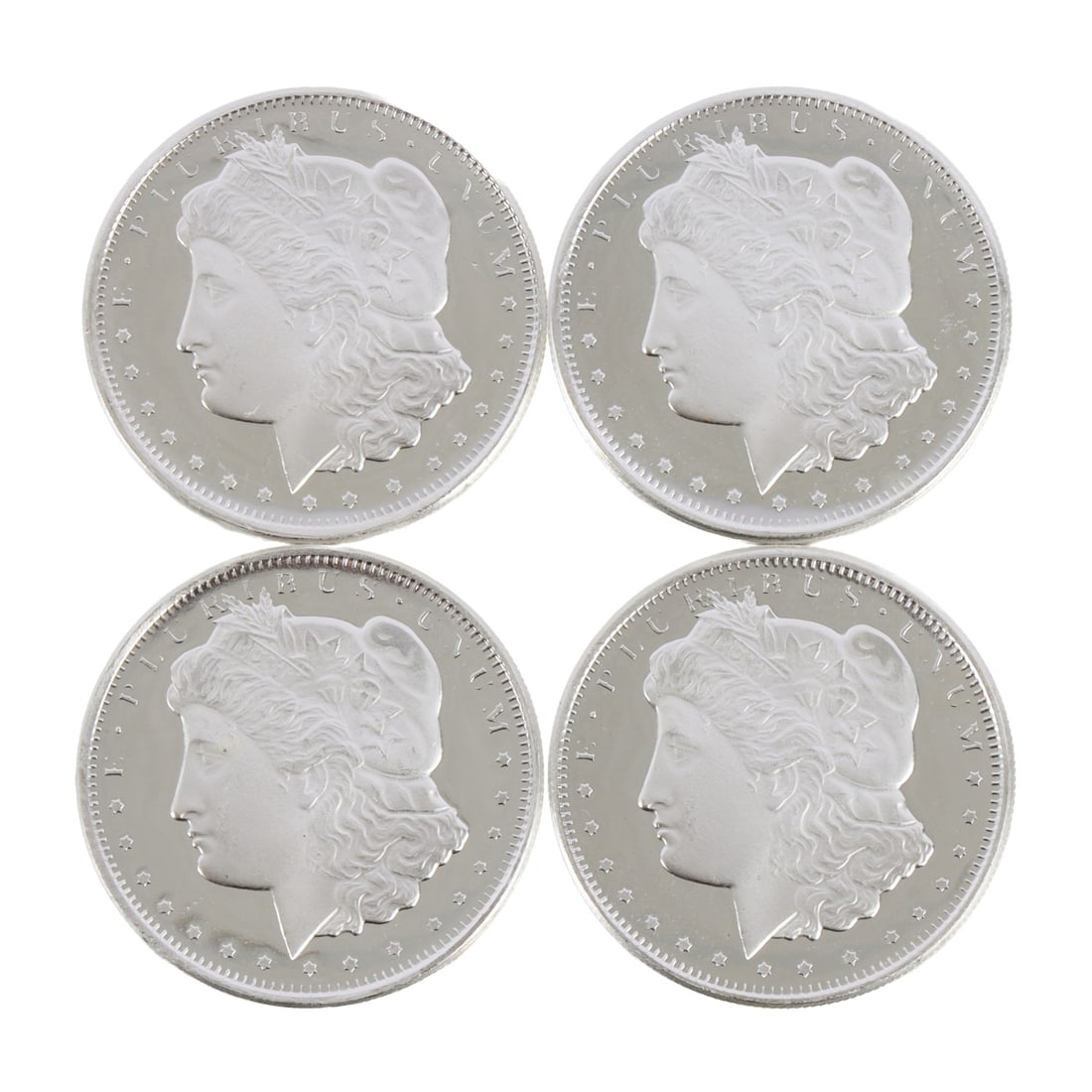 4 HALF OUNCE .999 SILVER MORGAN ROUNDS: Fine silver. This lot has a reserve.