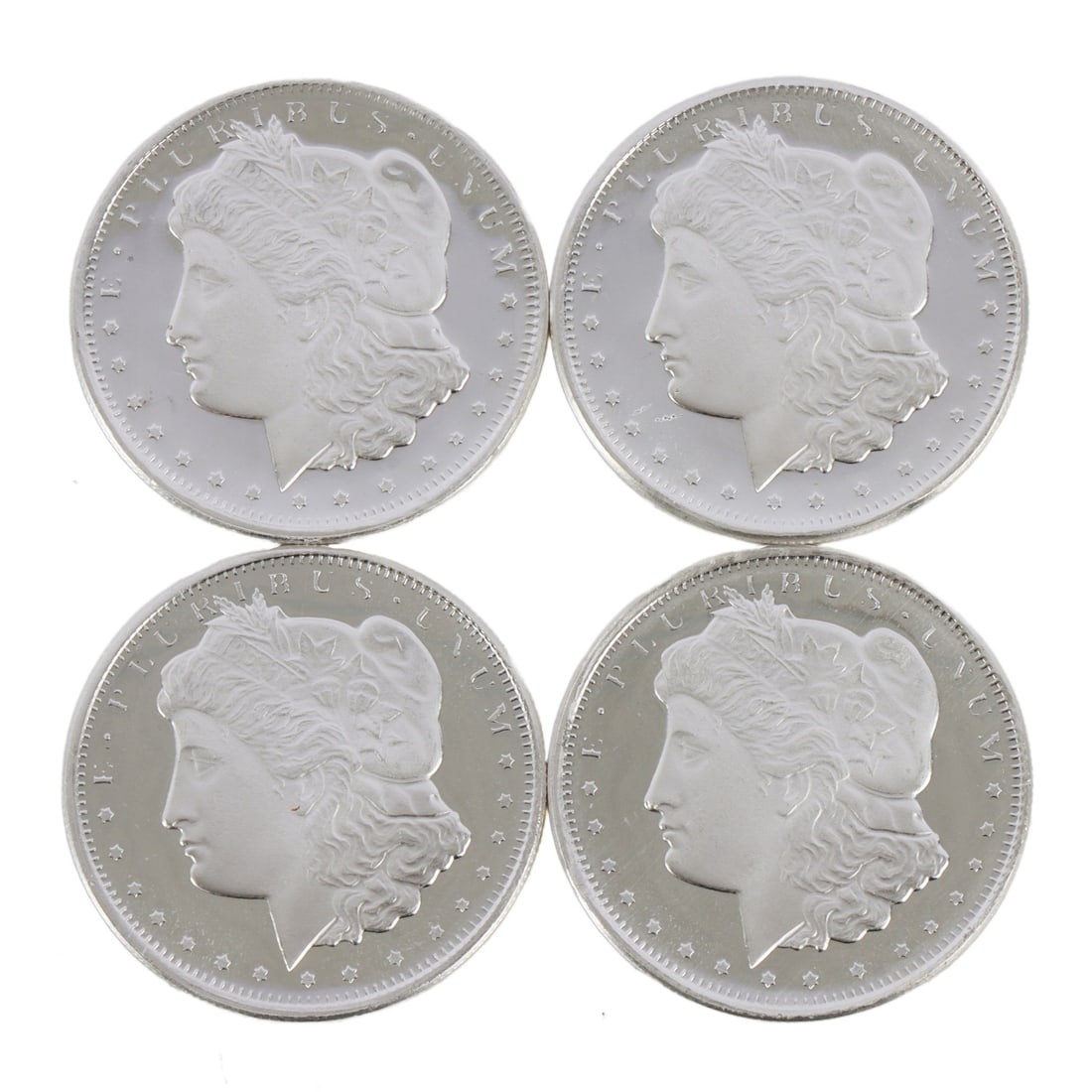 4 HALF OUNCE .999 SILVER MORGAN ROUNDS: Fine silver. This lot has a reserve.