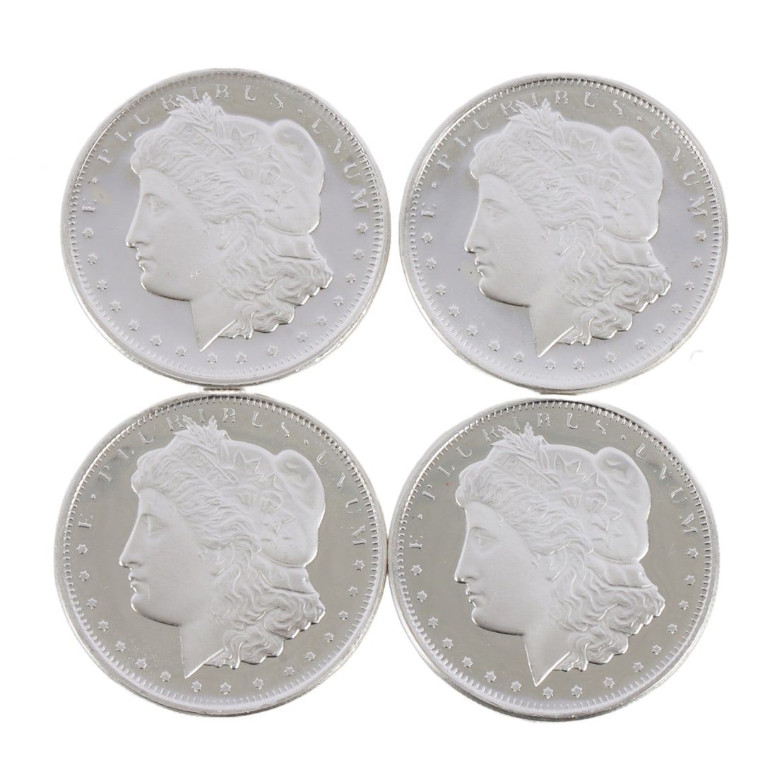 4 HALF OUNCE .999 SILVER MORGAN ROUNDS: Fine silver. This lot has a reserve.