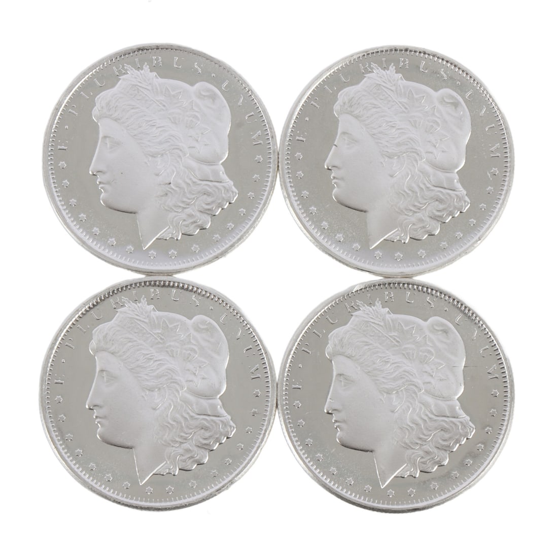 4 HALF OUNCE .999 SILVER MORGAN ROUNDS: Fine silver. This lot has a reserve.