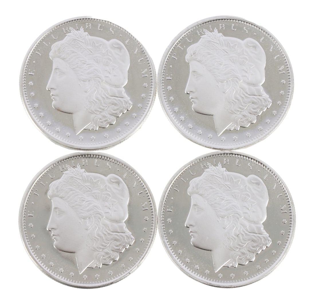 4 HALF OUNCE .999 SILVER MORGAN ROUNDS: Fine silver. This lot has a reserve.