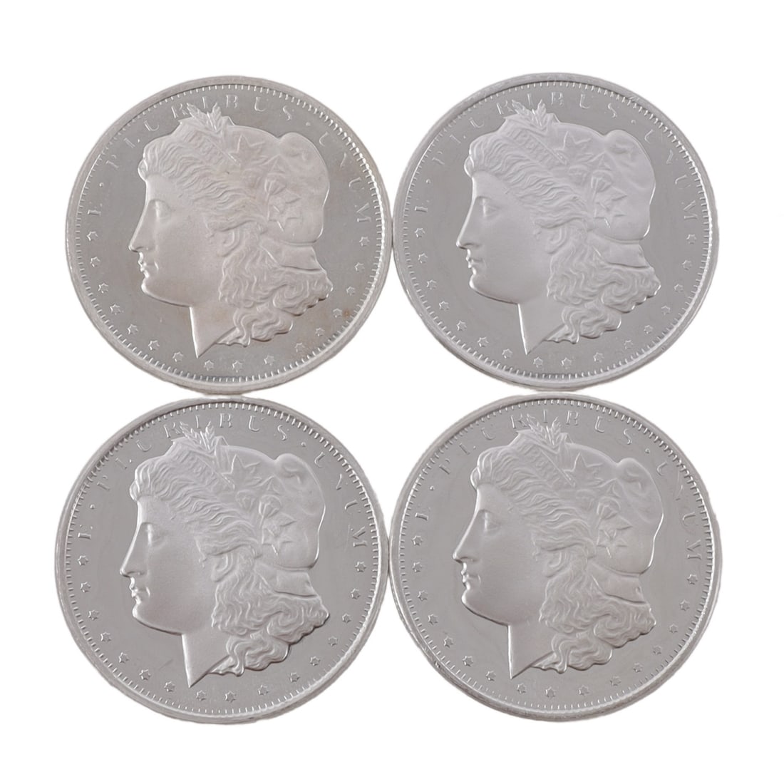 4 HALF TROY OUNCE .999 SILVER MORGAN ROUNDS: Fine silver. This lot has a reserve.