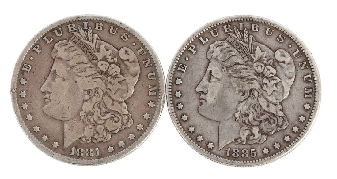 TWO MORGAN DOLLARS .900 SILVER: 1881 and 1885. This lot has a reserve.