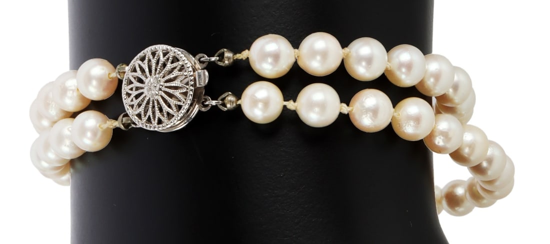 JAPANESE PEARL DOUBLE STRAND BRACELET 14K CLASP: Double strand Japanese pearl bracelet with 14k filigree mum clasp. Pearl strand measures 18 inches. Clasp measures 7.5 millimeters. 1.14 millimeter pearls. This lot has a reserve.
