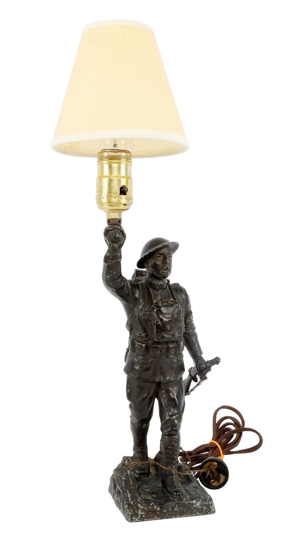 WWI SPIRIT OF THE AMERICAN DOUGHBOY LAMP VIQUESNEY: Antique patriotic lamp. Base marked "Spirit of the American Doughboy." On reverse, "Copyrighted by E.M. Viquesney - Sculptor, Americus - Georgia." Height 16.5 inches. This lot has a reserve.