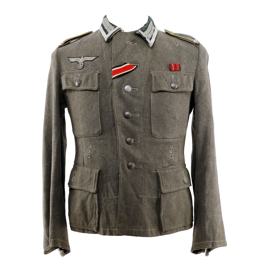 WWII GERMAN THIRD REICH MOUNTAIN TROOP UNIFORM M42: An M42 mountain tunic for a member of the Heer of the German Third Reich. Iron Cross ribbon mount, ribbon bar. Yellow shoulder tabs indicate troops standard. Non-fluorescing. The collar has been repla
