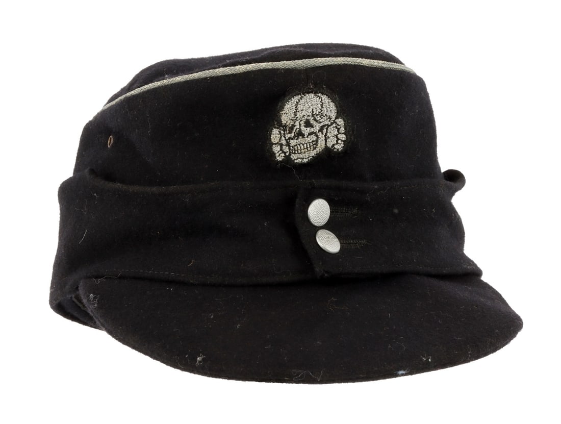 WWII GERMAN REICH SS M43 FIELD CAP: Black wool construction with Totenkopf patch and Reichsadler patch. Pebbled buttons are aluminum. No ink stamp for size but standard issue.