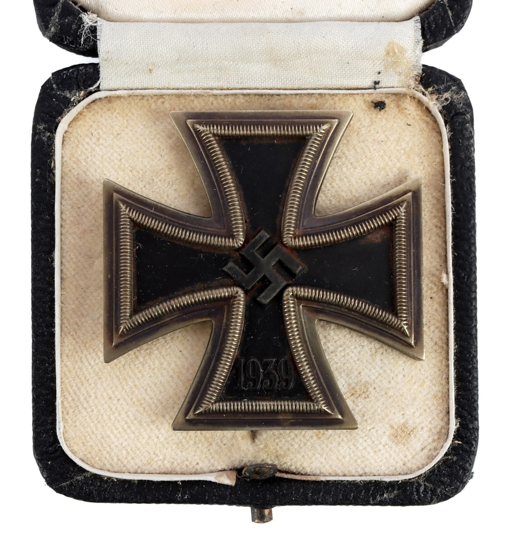 WWII GERMAN IRON CROSS FIRST CLASS W CASE: 1939 Iron Cross. Two piece frame with magnetic core. Reverse is marked L/11. It measures 1 3/4 inches. Comes in period case. This lot has a reserve.