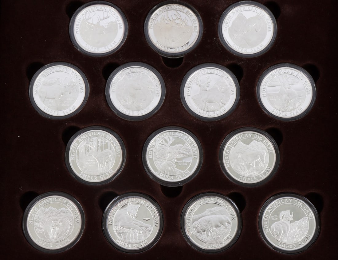 BIG GAME SUPER SLAM .999 SILVER 14 COIN COLLECTION: Lot of fourteen (14) 1 ozt .999 fine silver proof coins. North American Hunting Club's North American Big Game Super Slam Silver Proof Collection. Includes case and COA. This lot has a reserve.