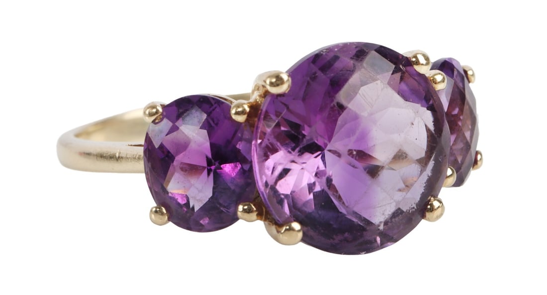 14KT YELLOW GOLD AMETHYST ROSE CUT RING 3.81 CT: Large 3 stone amethyst rose cut 14kt yellow gold ring. Stone size measured in setting center stone 10.83 X 10.81 mm side stones 7.08 X 5.53 mm. Size 9.5. Stamped on shank "14kt HB." This lot has a res