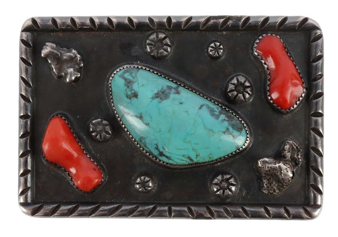 VINTAGE SILVER TURQUOISE CORAL BELT BUCKLE SIGNED: Sterling silver belt buckle with turquoise and coral. Signed on back D.B likely for Navajo artist Daniel Benally . Size 3 X 2 inches. This lot has a reserve.