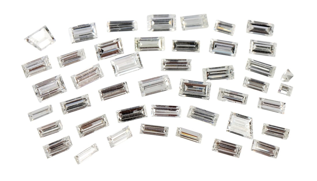 RECLAIMED LOOSE DIAMONDS BEGUETTE CUT 2.1 TCW: Loose diamonds reclaimed from platinum brooch. 42 baguette cut diamonds weighting approximately 0.02 carats (2.5 X 1.0 mm) to 0.10 carats ( 3.5 X 1.9 mm). Clarity : VVS-1 to VVS-2, Color grade : E to