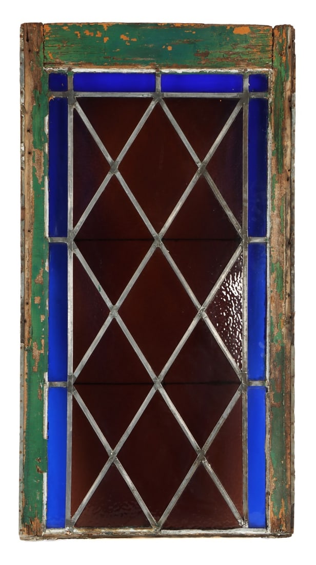 STAINED GLASS WINDOW FROM A PENNSYLVANIA CHURCH: A stained glass window from a church in Pennsylvania. This piece shows evidence of two types of stained glass in varying levels of ripple effect. The construction of these windows is strongly indicati