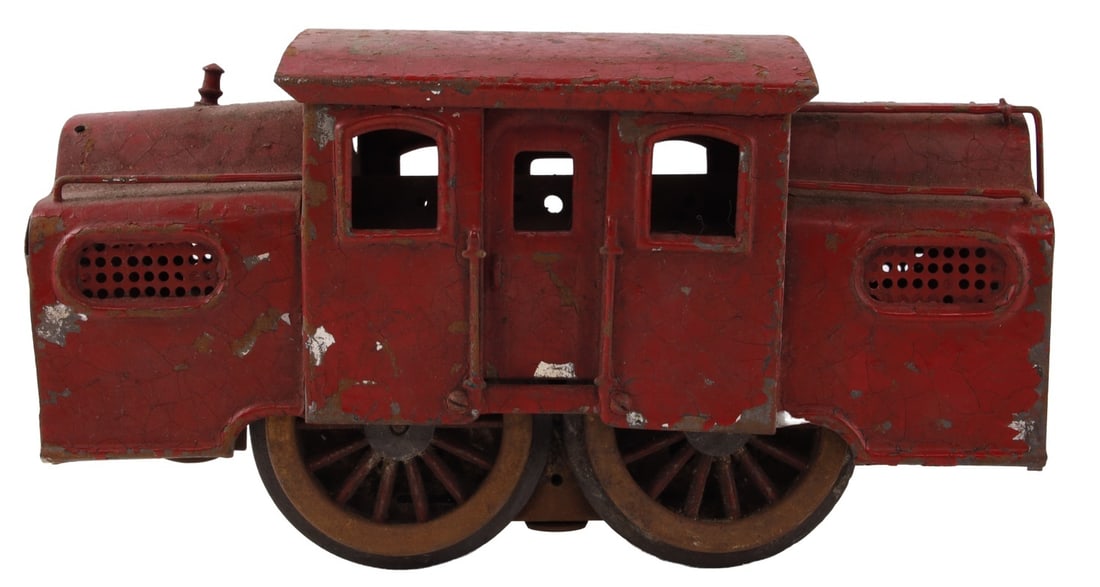 LIONEL MODEL TRAIN ENGINE NO. 38: An early Lionel model number 38 train engine, with red paint job. This lot has a reserve.