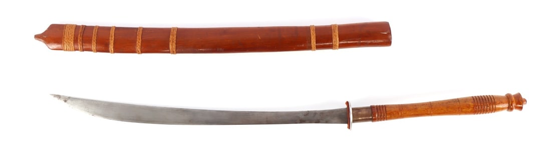 SOUTHEAST ASIAN DHA SWORD BURMESE: A dha blade from Southeast Asia, likely Burma or Thailand origin. Appears to be a tourist piece from the 1950s or 1960s based on handle. Total length is 34.5 inches.