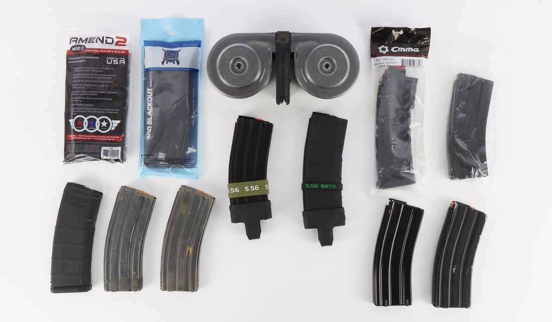 AR-15 30RD MAGAZINE PMAG STEEL 100RD DRUM 12 PCS: Lot of twelve (12) AR-15 magazines, including 100-rd 5.56 drum. Most are 5.56, one is .22 CMMG, one is .300 BLK.