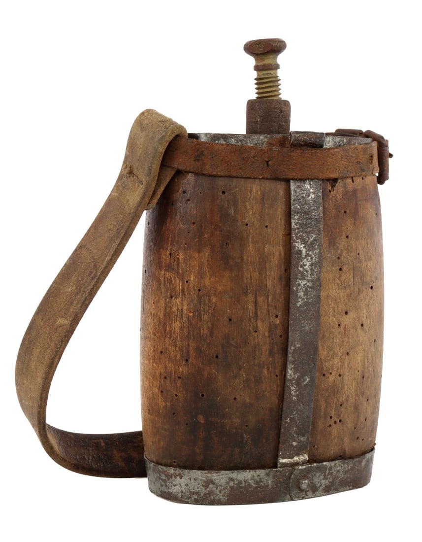 EARLY ITALIAN CANTEEN WITH UNUSUAL SPOUT & STOPPER: A unique version of an Italian water bottle canteen, with distinctive spout and screw in stopper. Hand strap intact. Some worming in the wood, but sturdy. This is a rather early iteration of this styl