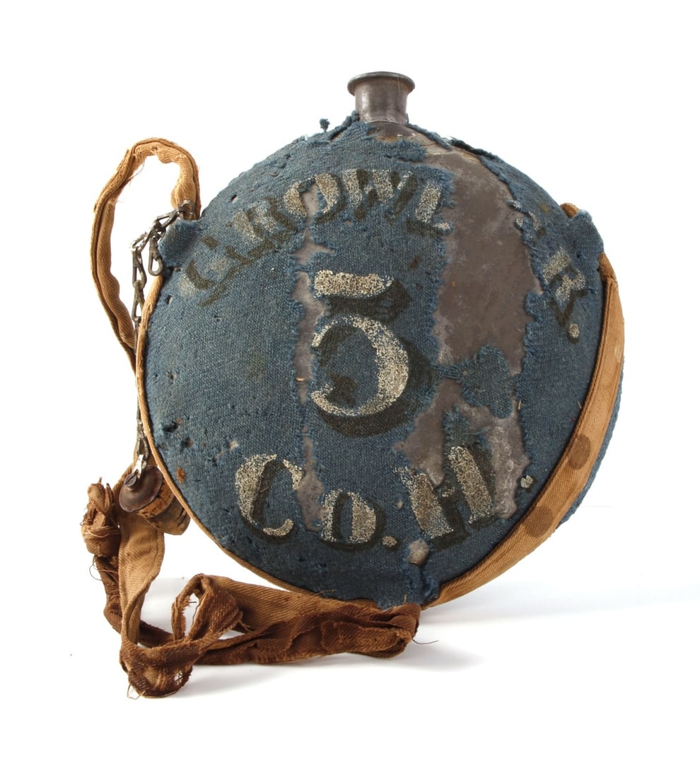 CIVIL WAR SMOOTH SIDE CANTEEN PAINTED COVER: US M1858 smooth side canteen with painted blue wool cover, stopper, chain and carry strap. Painted with regimental and corps identification, and retains partial name.