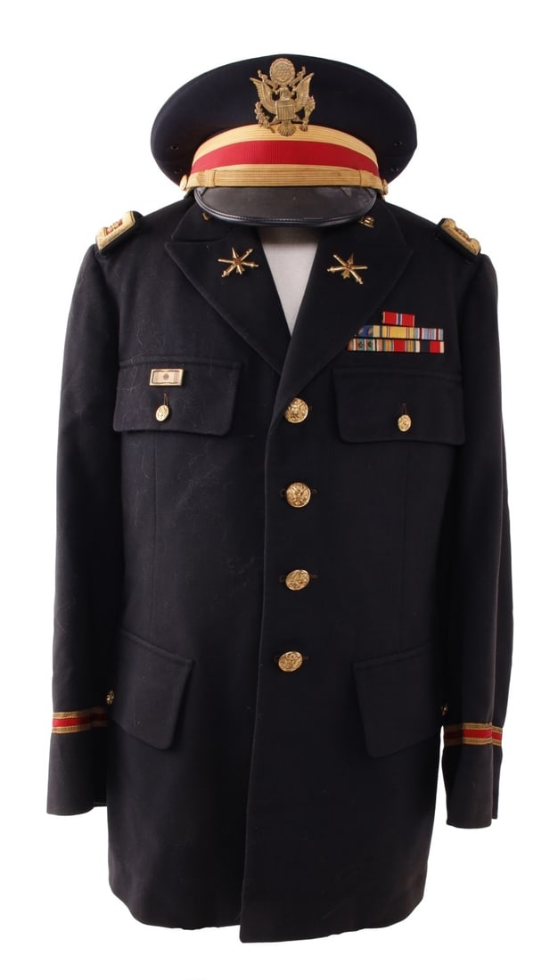 VIETNAM US ARMY 8TH ARTILLERY MAJOR'S JACKET & CAP: Lot of two (2) pieces. Includes service jacket of blue wool with lapel insignia, ribbon bar and shoulder boards of a major. Also includes matching visor cap, size 7-1/4. Jacket personalized "Robert Ro