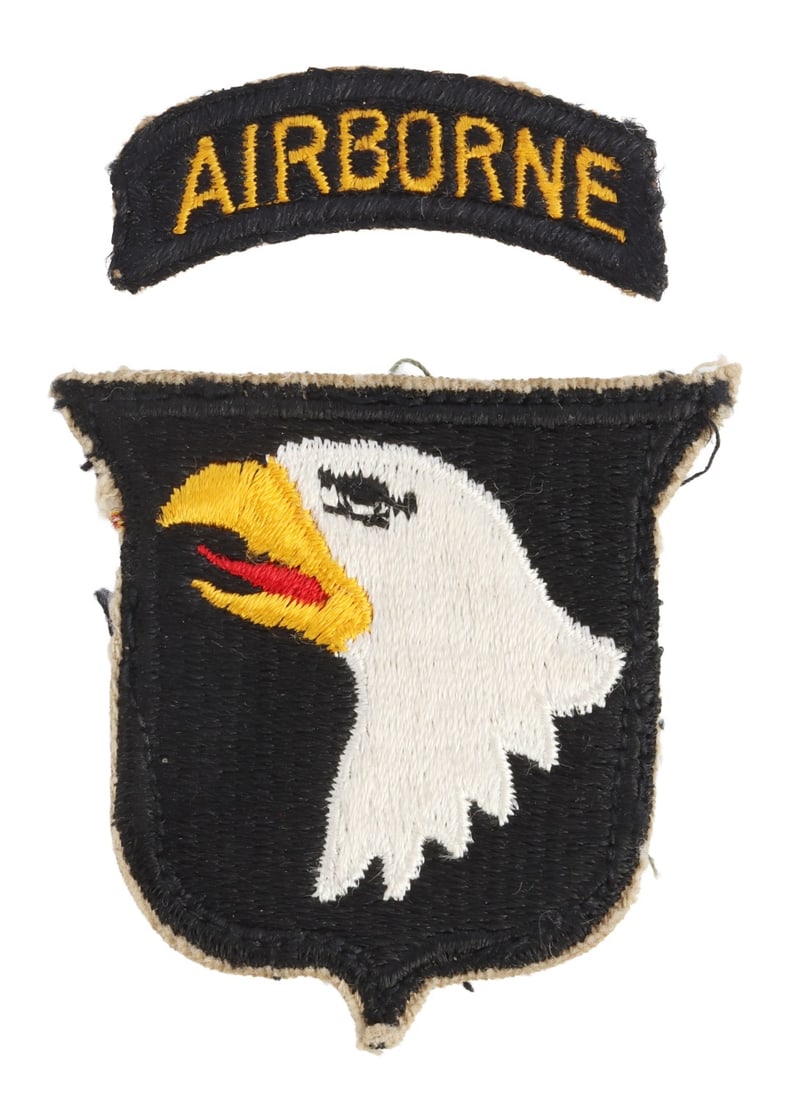 WWII US 101ST AIRBORNE SHOULDER PATCH: The 'screaming eagle' patch of the 101st Airborne. In two pieces.
