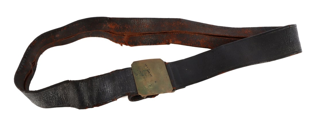 WWI FRENCH LEATHER BELT WITH BRASS BUCKLE: Leather belt with fiber core and solid brass belt buckle. Clipped corner buckle, dimensions 2.25 x 2.5 inches. Belt stamped "39." Otherwise, no apparent markings.