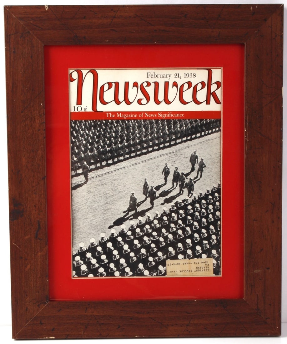 1938 NEWSWEEK FEATURING ADOLF HITLER: An issue of Newsweek, featuring German dictator Adolf Hitler. Dated February 21, 1938. Framed, but frame can be removed for shipping. 14.75 X 17.75 inches.